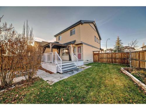 34 Sunset Heights, Cochrane, AB - Outdoor With Deck Patio Veranda