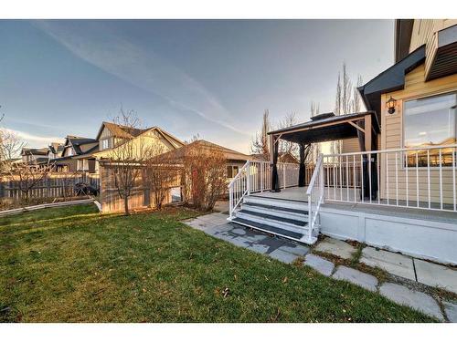 34 Sunset Heights, Cochrane, AB - Outdoor With Deck Patio Veranda