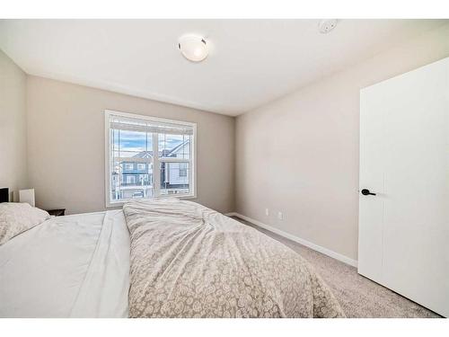 534 Copperstone Manor Se, Calgary, AB - Indoor Photo Showing Bedroom