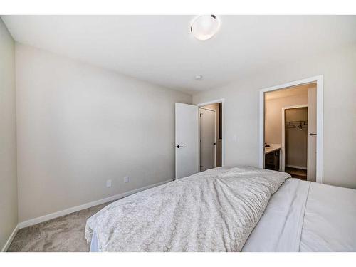 534 Copperstone Manor Se, Calgary, AB - Indoor Photo Showing Bedroom