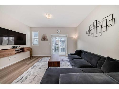 534 Copperstone Manor Se, Calgary, AB - Indoor Photo Showing Living Room