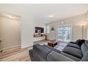 534 Copperstone Manor Se, Calgary, AB  - Indoor Photo Showing Living Room 