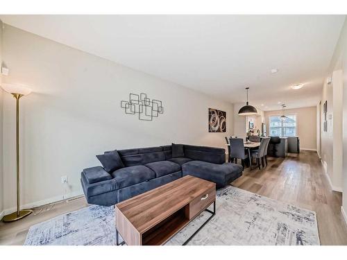 534 Copperstone Manor Se, Calgary, AB - Indoor Photo Showing Living Room