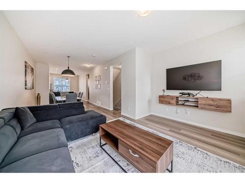 534 Copperstone Manor Se, Calgary, AB - Indoor Photo Showing Living Room