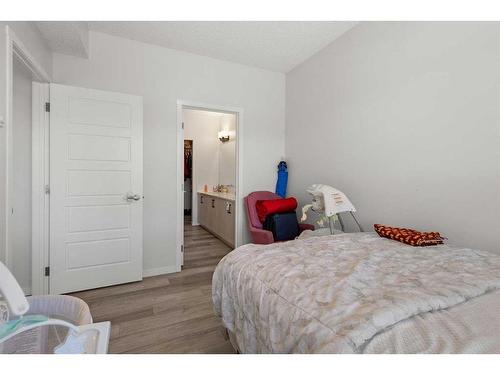 206-40 Carrington Plaza Nw, Calgary, AB - Indoor Photo Showing Bedroom