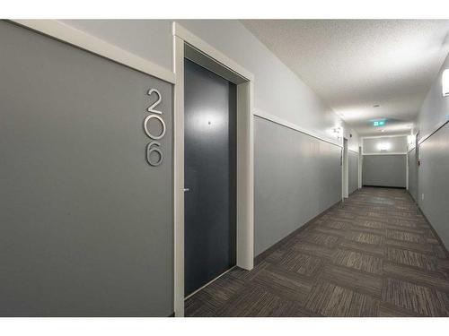 206-40 Carrington Plaza Nw, Calgary, AB - Indoor Photo Showing Other Room