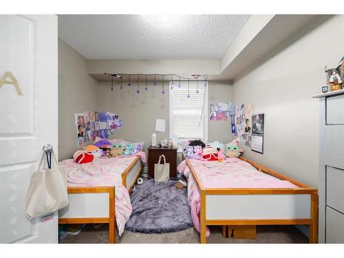 2410-625 Glenbow Drive, Cochrane, AB - Indoor Photo Showing Bedroom