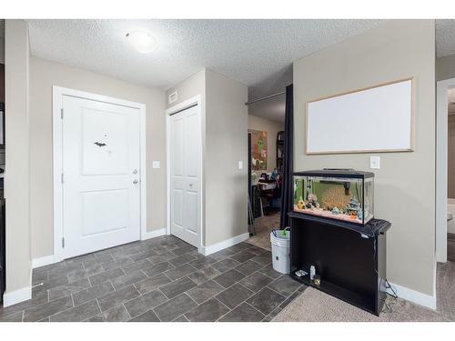 2410-625 Glenbow Drive, Cochrane, AB - Indoor Photo Showing Other Room