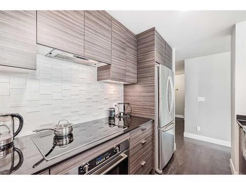 506-1500 7 Street Sw, Calgary, AB - Indoor Photo Showing Kitchen With Stainless Steel Kitchen With Upgraded Kitchen