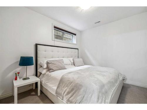 724 14A Street Se, Calgary, AB - Indoor Photo Showing Bedroom