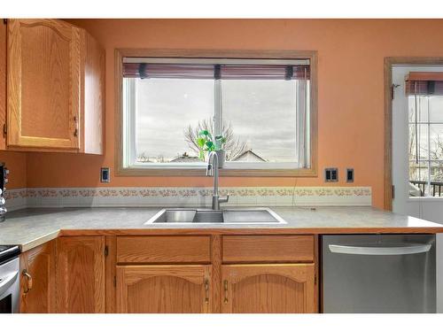 116 Country Hills Way Nw, Calgary, AB - Indoor Photo Showing Kitchen With Double Sink