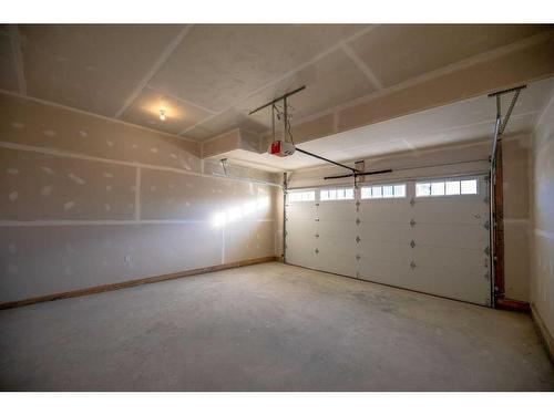 494 Clydesdale Way, Cochrane, AB - Indoor Photo Showing Garage