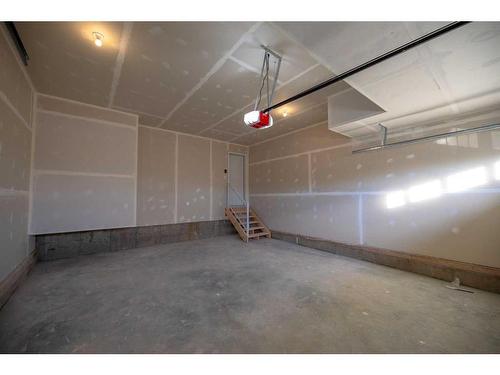 494 Clydesdale Way, Cochrane, AB - Indoor Photo Showing Garage