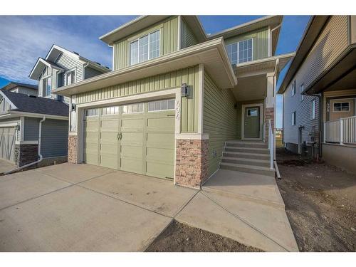 494 Clydesdale Way, Cochrane, AB - Outdoor With Facade