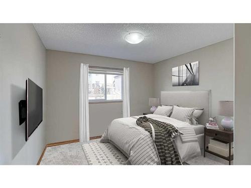 83 Sunset Circle, Cochrane, AB - Indoor Photo Showing Bedroom