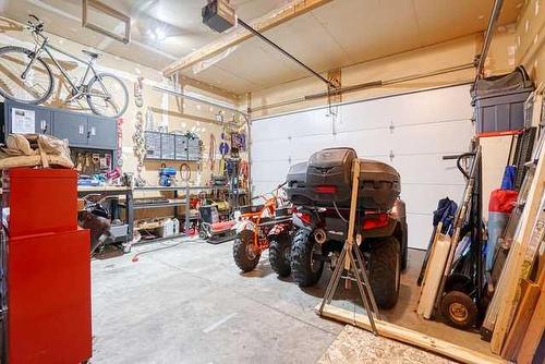 83 Sunset Circle, Cochrane, AB - Indoor Photo Showing Garage