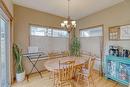 83 Sunset Circle, Cochrane, AB  - Indoor Photo Showing Dining Room 