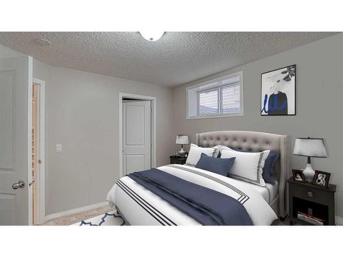 83 Sunset Circle, Cochrane, AB - Indoor Photo Showing Bedroom