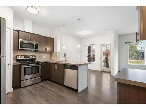 118 Copperpond Landing Se, Calgary, AB - Indoor Photo Showing Kitchen With Stainless Steel Kitchen