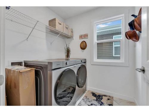 220 Herron Mews Ne, Calgary, AB - Indoor Photo Showing Laundry Room