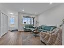 220 Herron Mews Ne, Calgary, AB  - Indoor Photo Showing Living Room 