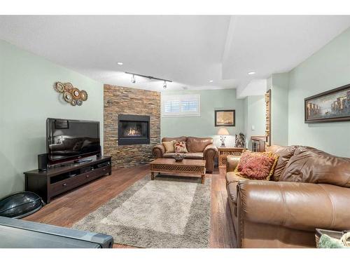 306 Douglas Park Boulevard Se, Calgary, AB - Indoor Photo Showing Living Room With Fireplace