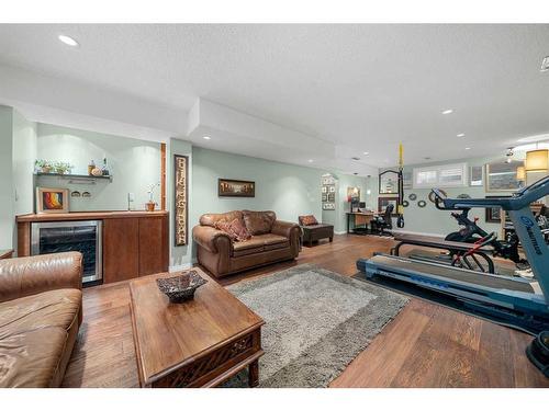 306 Douglas Park Boulevard Se, Calgary, AB - Indoor Photo Showing Living Room With Fireplace