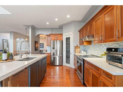 204 Sienna Park Heath Sw, Calgary, AB - Indoor Photo Showing Kitchen With Stainless Steel Kitchen With Double Sink With Upgraded Kitchen