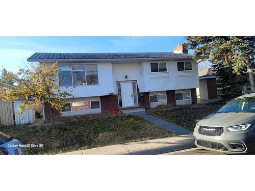 240 Rundleview Drive Ne, Calgary, AB - Outdoor With Facade