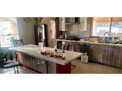 240 Rundleview Drive Ne, Calgary, AB - Indoor Photo Showing Kitchen With Double Sink