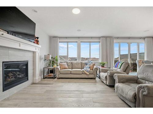 199 Lucas Terrace Nw, Calgary, AB - Indoor Photo Showing Living Room With Fireplace