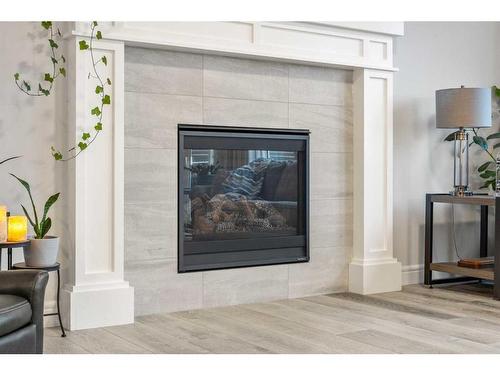 199 Lucas Terrace Nw, Calgary, AB - Indoor Photo Showing Living Room With Fireplace