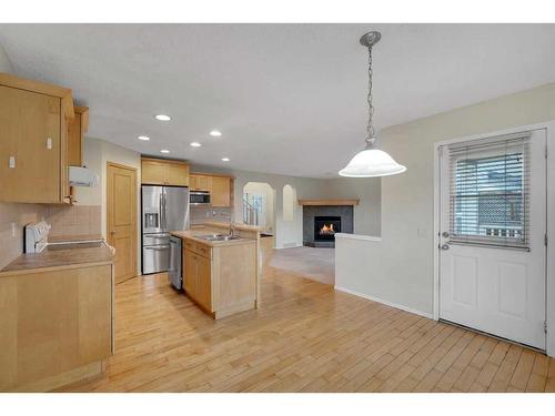 143 Brightondale Crescent Se, Calgary, AB - Indoor Photo Showing Kitchen With Double Sink