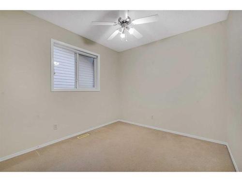 143 Brightondale Crescent Se, Calgary, AB - Indoor Photo Showing Other Room