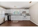 6428 Silver Springs Way Nw, Calgary, AB  - Indoor Photo Showing Kitchen With Double Sink 