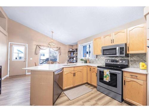 151 Somerglen Common Sw, Calgary, AB - Indoor Photo Showing Kitchen With Stainless Steel Kitchen