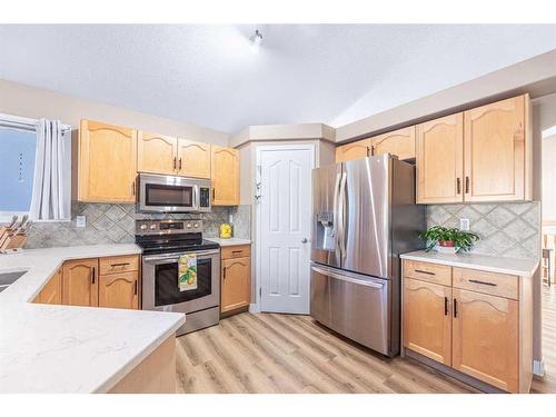 151 Somerglen Common Sw, Calgary, AB - Indoor Photo Showing Kitchen With Stainless Steel Kitchen