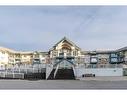 211-7239 Sierra Morena Boulevard Sw, Calgary, AB  - Outdoor With Balcony With Facade 