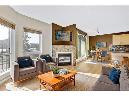 203-108 15 Avenue Se, Calgary, AB - Indoor Photo Showing Living Room With Fireplace