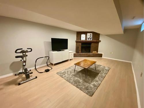 3734 42 Street Sw, Calgary, AB - Indoor With Fireplace