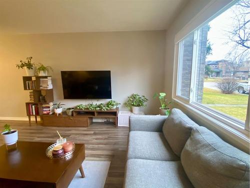 3734 42 Street Sw, Calgary, AB - Indoor Photo Showing Living Room