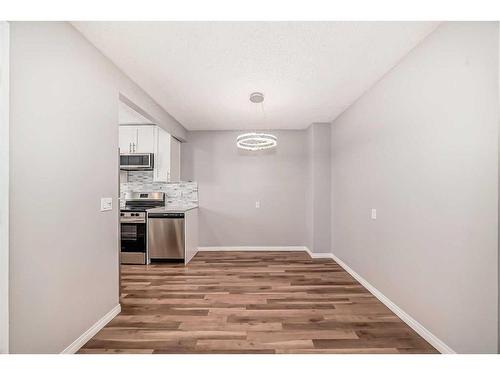 132-7172 Coach Hill Road Sw, Calgary, AB - Indoor Photo Showing Kitchen