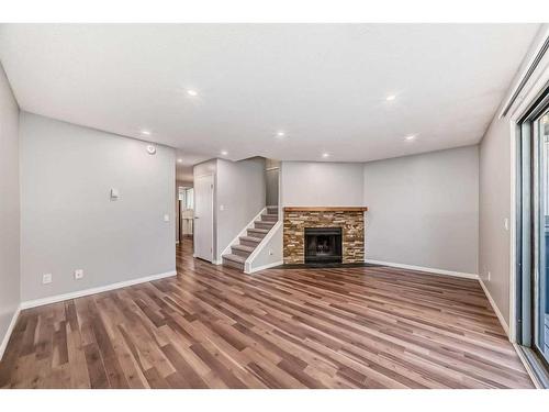 132-7172 Coach Hill Road Sw, Calgary, AB - Indoor With Fireplace