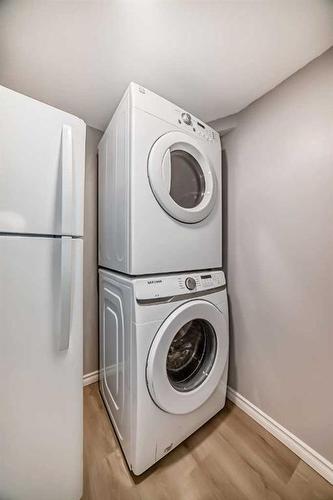 132-7172 Coach Hill Road Sw, Calgary, AB - Indoor Photo Showing Laundry Room