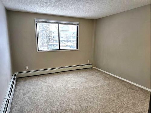 201B-7301 4A Street Sw, Calgary, AB - Indoor Photo Showing Other Room