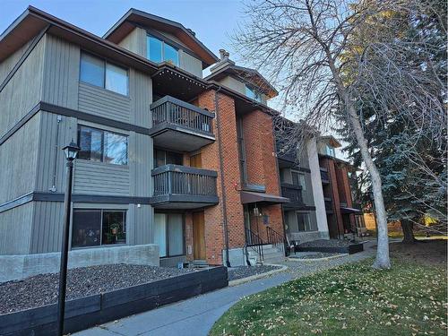 201B-7301 4A Street Sw, Calgary, AB - Outdoor With Balcony With Facade