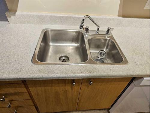 201B-7301 4A Street Sw, Calgary, AB - Indoor Photo Showing Kitchen With Double Sink