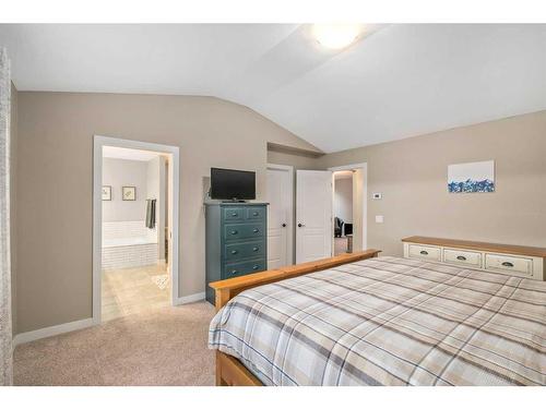 18 Masters Mews Se, Calgary, AB - Indoor Photo Showing Bedroom