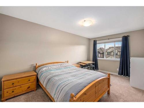 18 Masters Mews Se, Calgary, AB - Indoor Photo Showing Bedroom