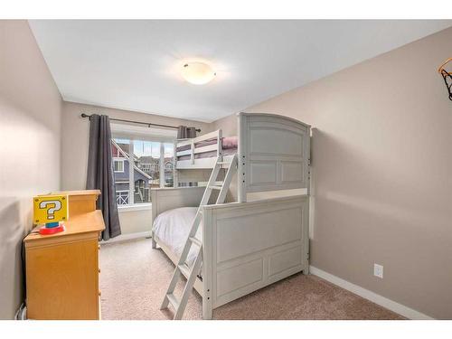 18 Masters Mews Se, Calgary, AB - Indoor Photo Showing Bedroom